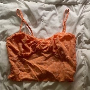 Orange crop top fits very well